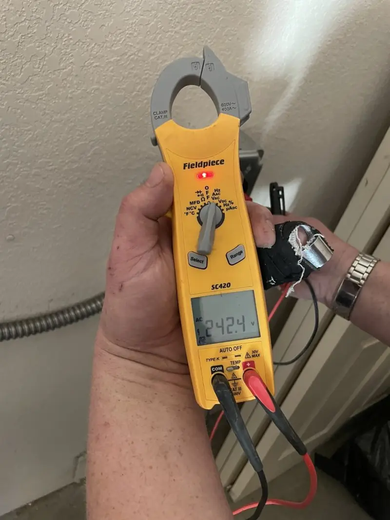 Voltage testing with clamp meter during Aluminum Wiring Replacement in Stockbridge